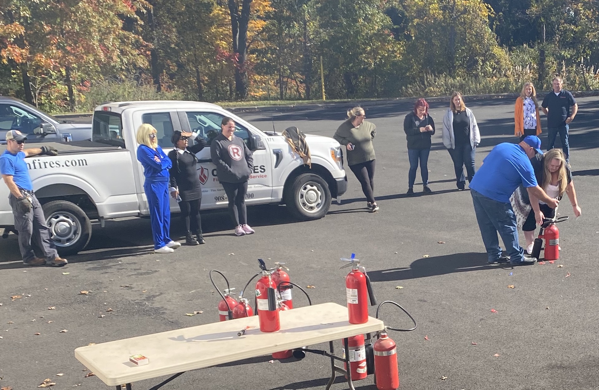 Team members of Confires meeting for a fire safety training.