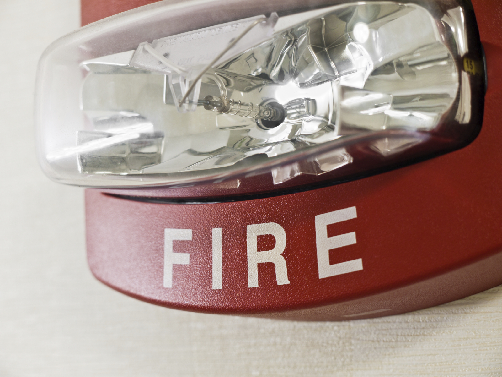 Red fire alarm with strobe light